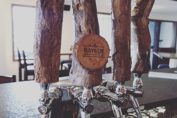 Tap handles made of driftwood.